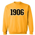 gold crewneck sweatshirt with 1906 embroidered across the chest.