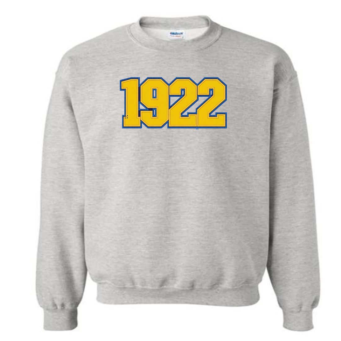 gold sweatshirt with '1922' and two baseball caps on a blurred background with 'Champion's Fashions' sign.