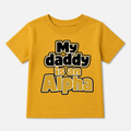 Yellow t-shirt with 'My daddy is an Alpha' text on a white background