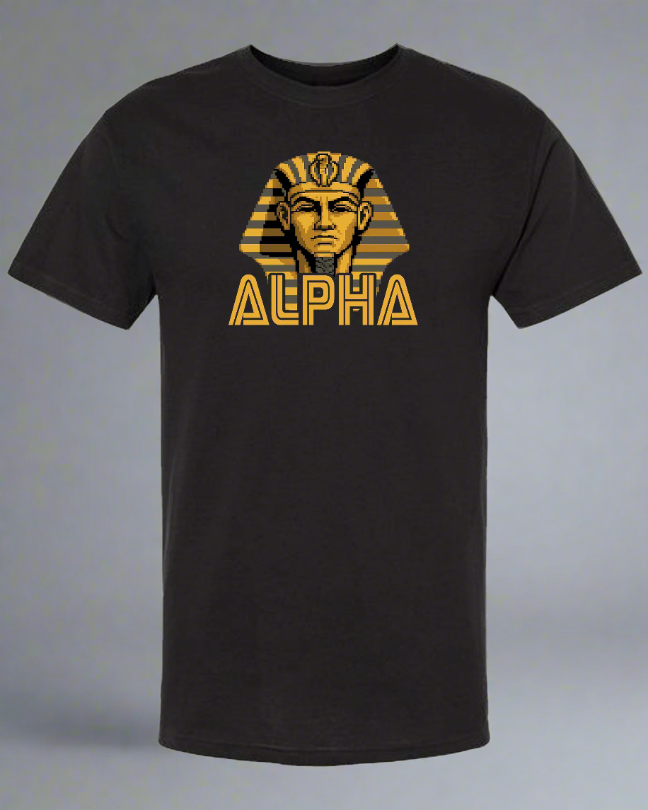 Black t-shirt with gold Egyptian pharaoh design and 'Alpha' text on a gray background