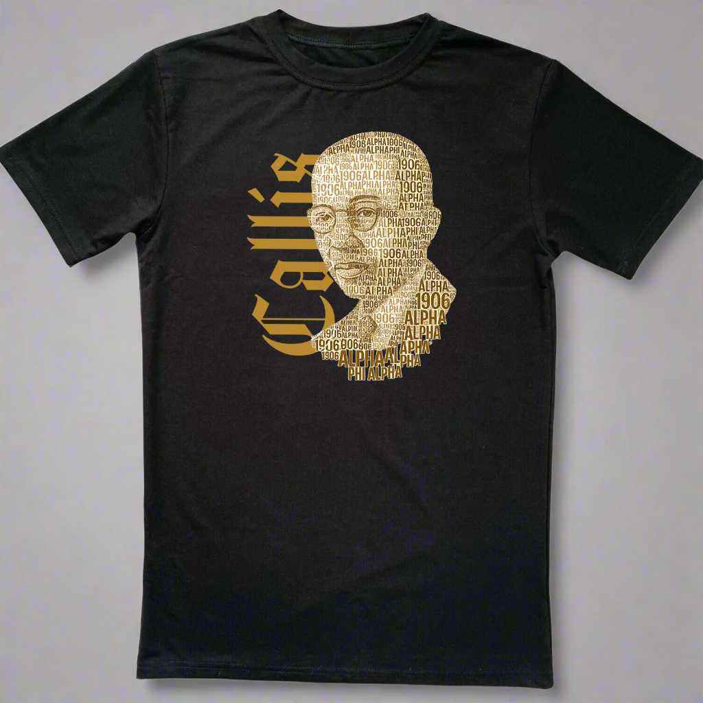 Black t-shirt with a gold graphic of a face and text on a gray background