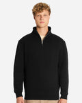 Man wearing a black quarter-zip sweatshirt on a white background