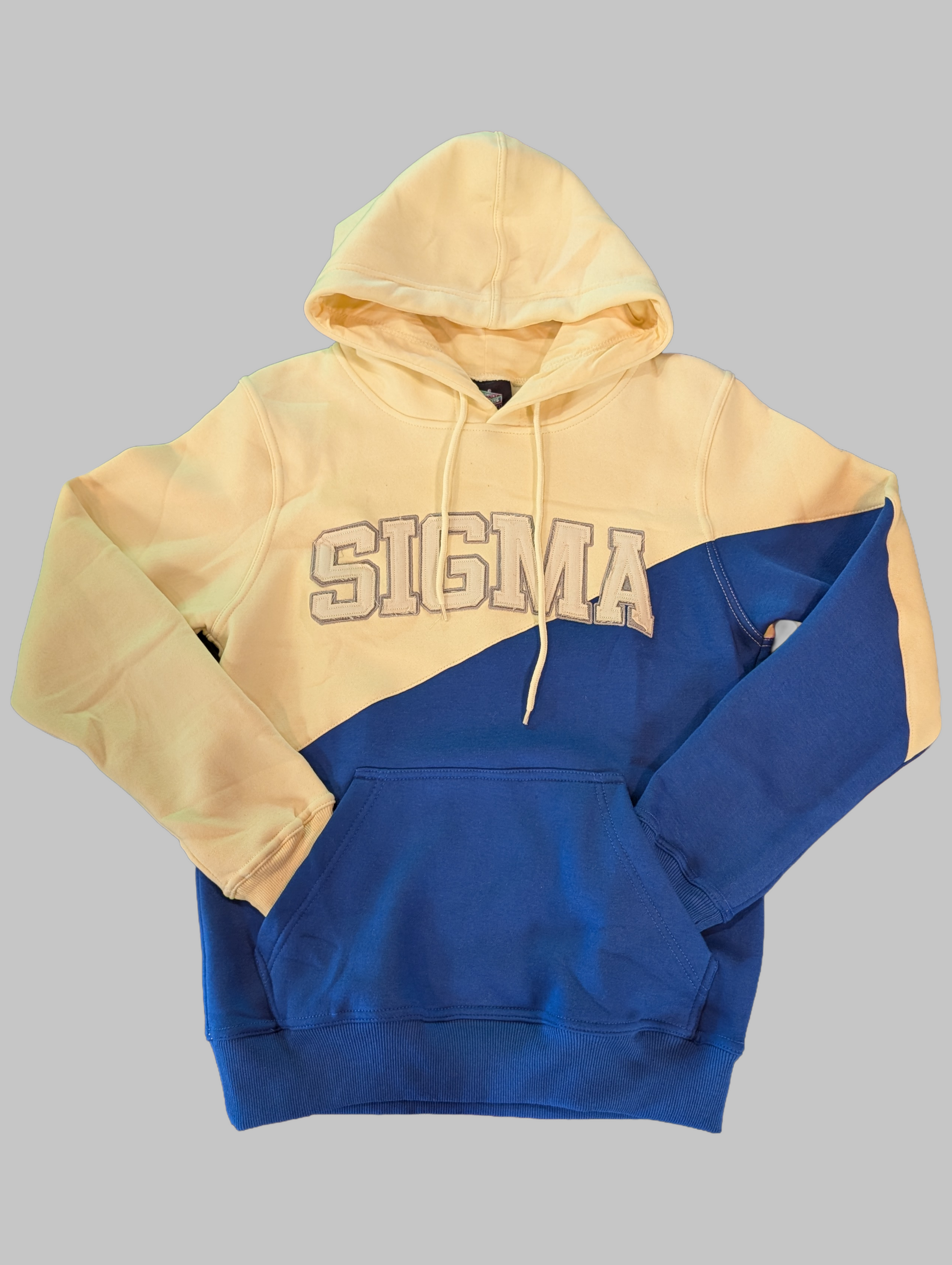 Two-tone cream and blue hoodie with 'SIGMA' text on a gray background