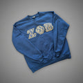 Blue sweatshirt with white greek letters for zeta phi beta sorority
