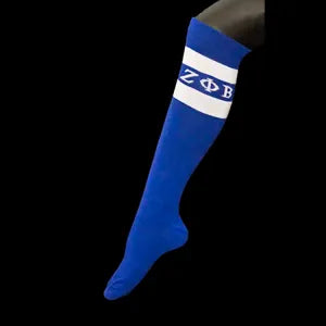 Blue knee-high socks with white stripes and Greek letters on a black background
