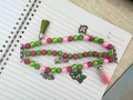 Pink and green beaded apple watch band/bracelet with tassels and charms for aka