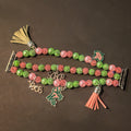 Pink and green beaded apple watch band/bracelet with tassels and charms for aka