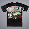 Black t-shirt with a colorful race car graphic on a wooden surface