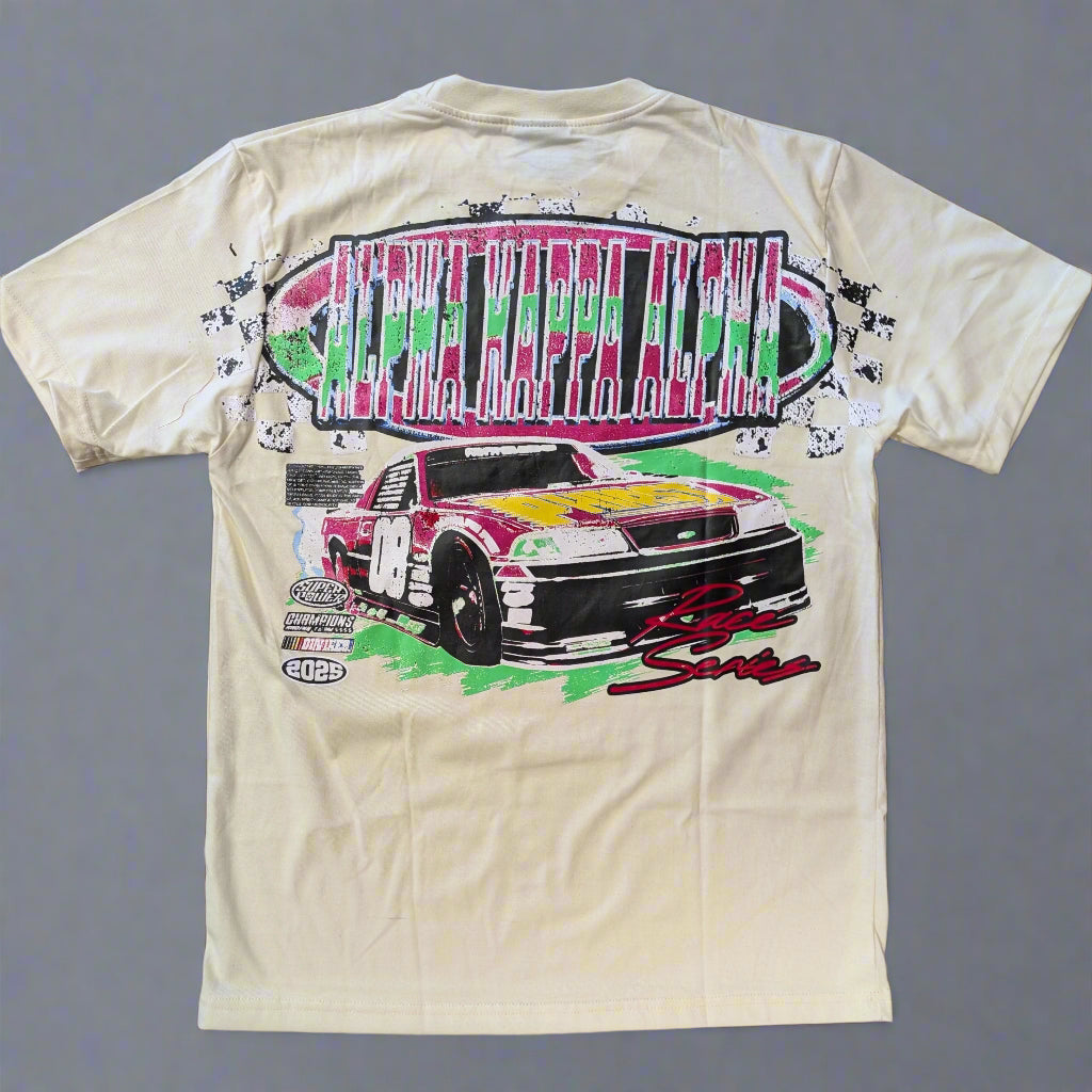 Beige t-shirt with a race car graphic and text on a gray background