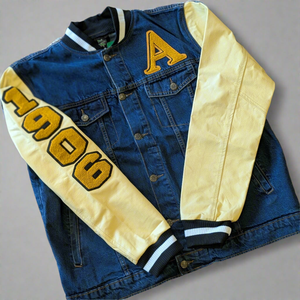 Blue denim jacket with yellow lettering and '1906' 