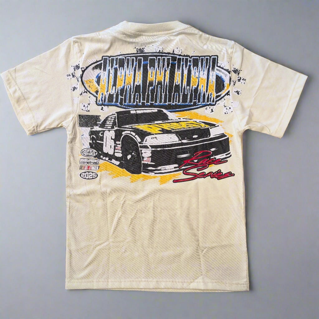 Black t-shirt with a graphic of a car and text on a wooden surface