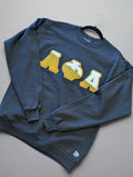 black sweatshirt with gold and white 