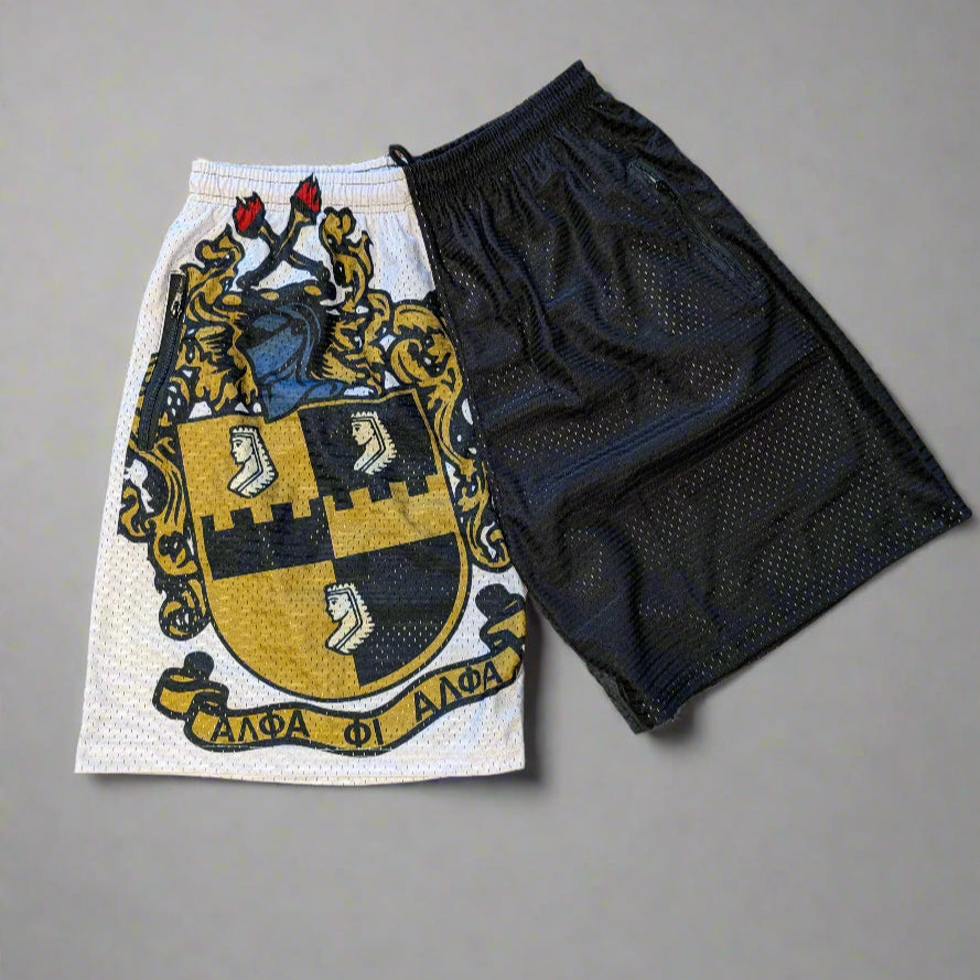 Pair of shorts with a crest design on a gray background