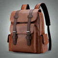 Brown leather backpack with straps on a white background