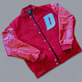 Red varsity jacket with a large white letter 'D' 