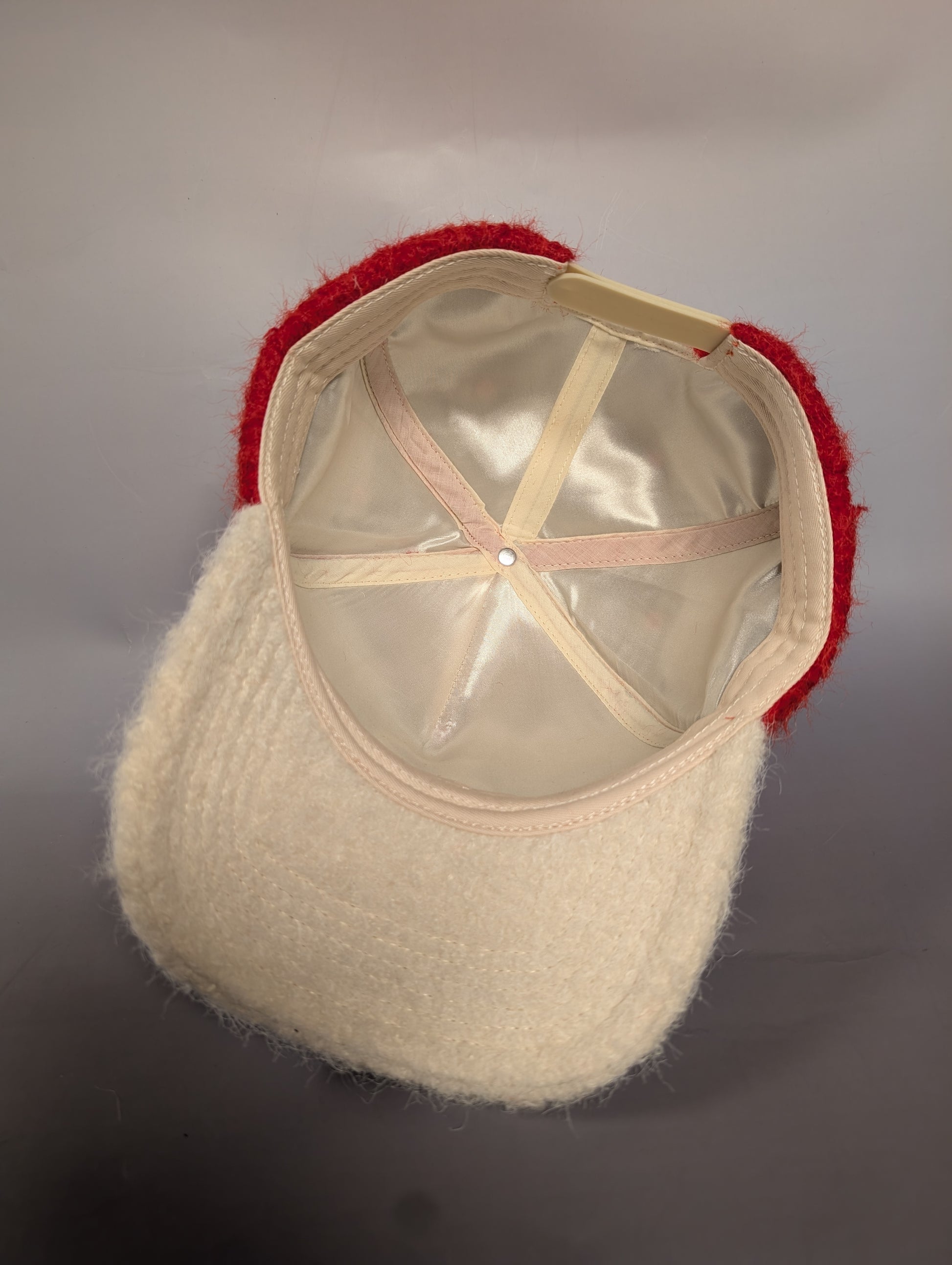 innerside of satin lined hat 
