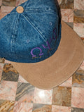 denim hat  with tan bill
