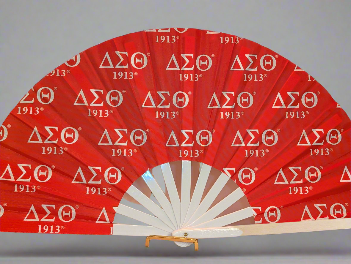 Red fan with Delta Sigma Theta symbols and '1913' printed on it against a gray background