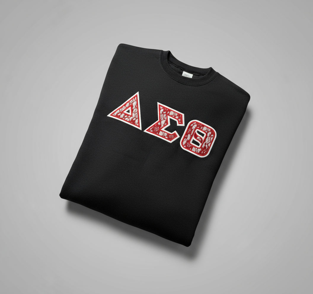 Black sweatshirt with red and white lettering on a gray background