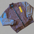 Brown jacket with a yellow 