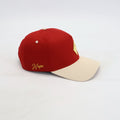 Red and cream cap with 'Nupe' embroidery on side
