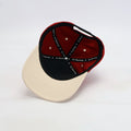 red and cream baseball cap with 
