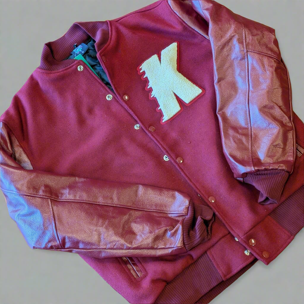 Red letterman jacket with a yellow 'K' 
