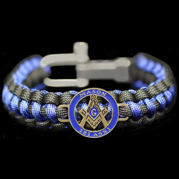 Bracelet with Masonic emblem and blue and gray braided design on a black background