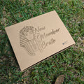 Cardboard box with 'New Member Crate' text and Pharaoh illustration on grass