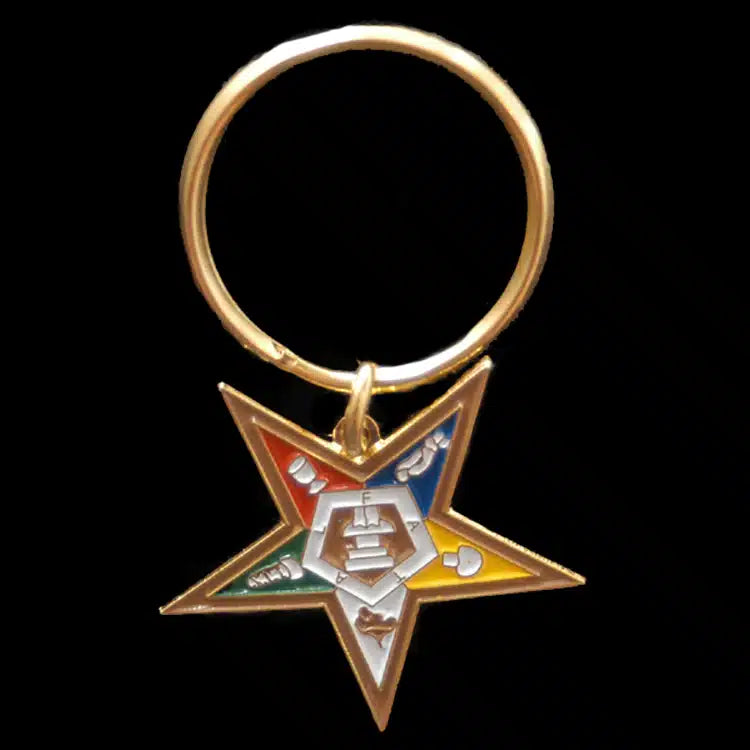 Gold keychain with a oes emblem 