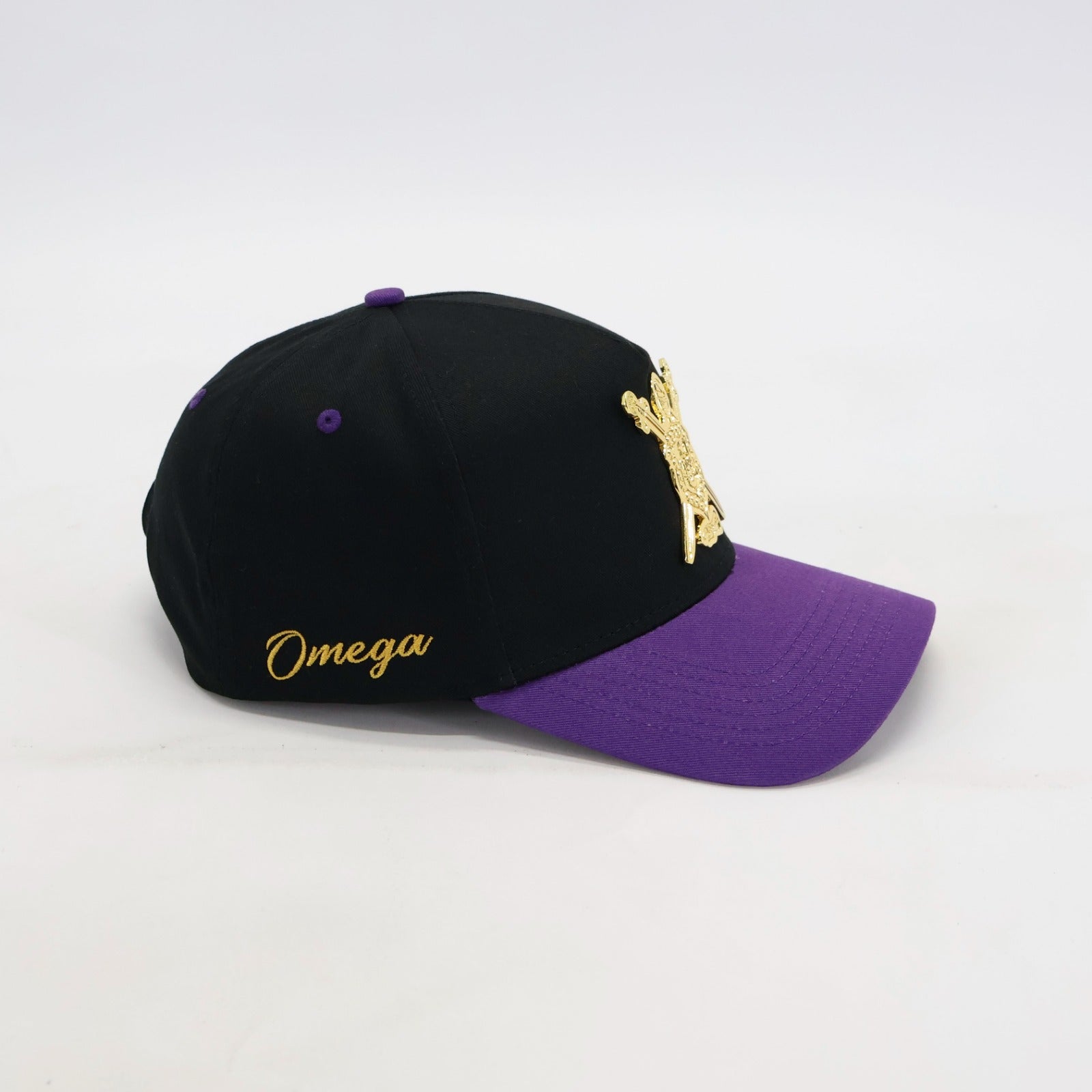 Black and purple cap with 'Omega' branding on a white background