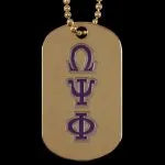 Gold dog tag necklace with purple Omega Psi Phi letters on a plain background