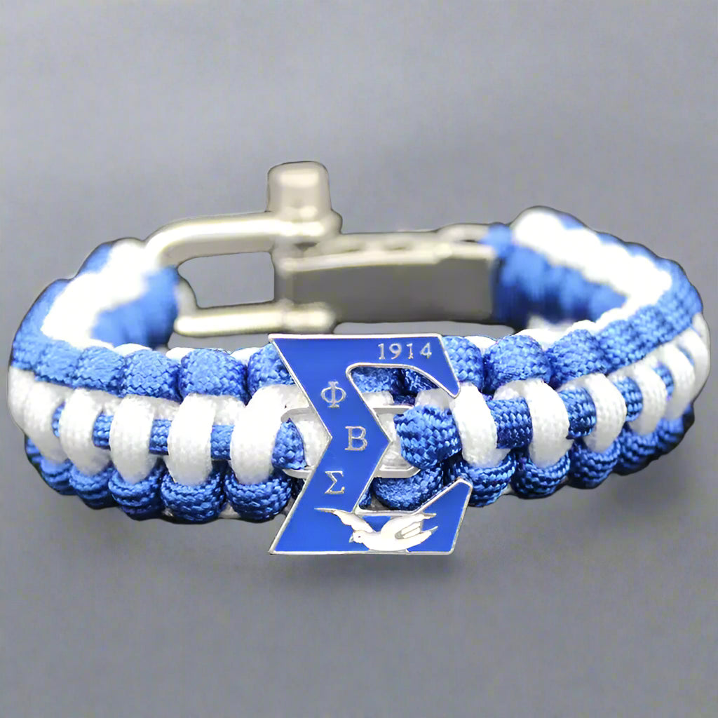 Blue and white braided bracelet with a metal clasp and Phi Beta Sigma logo 