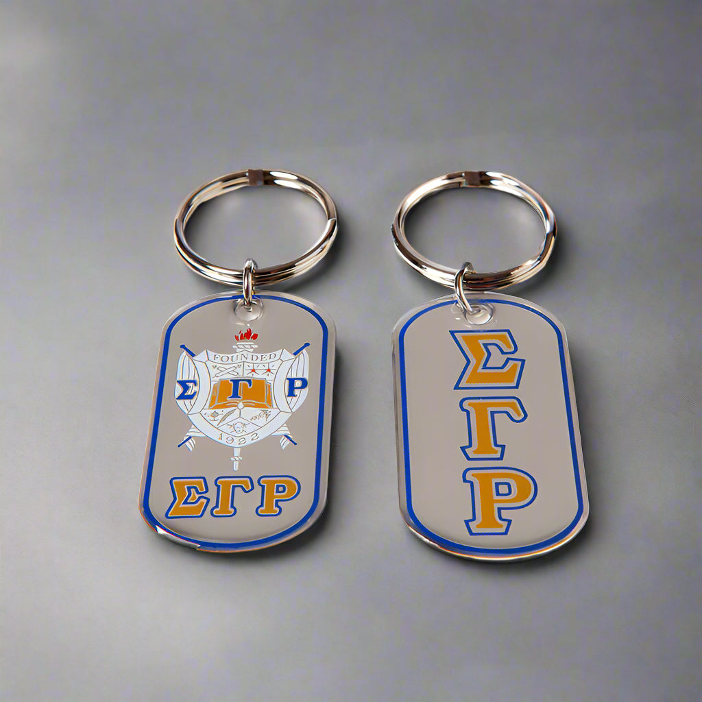 Two keychains with a logo and text on a white background