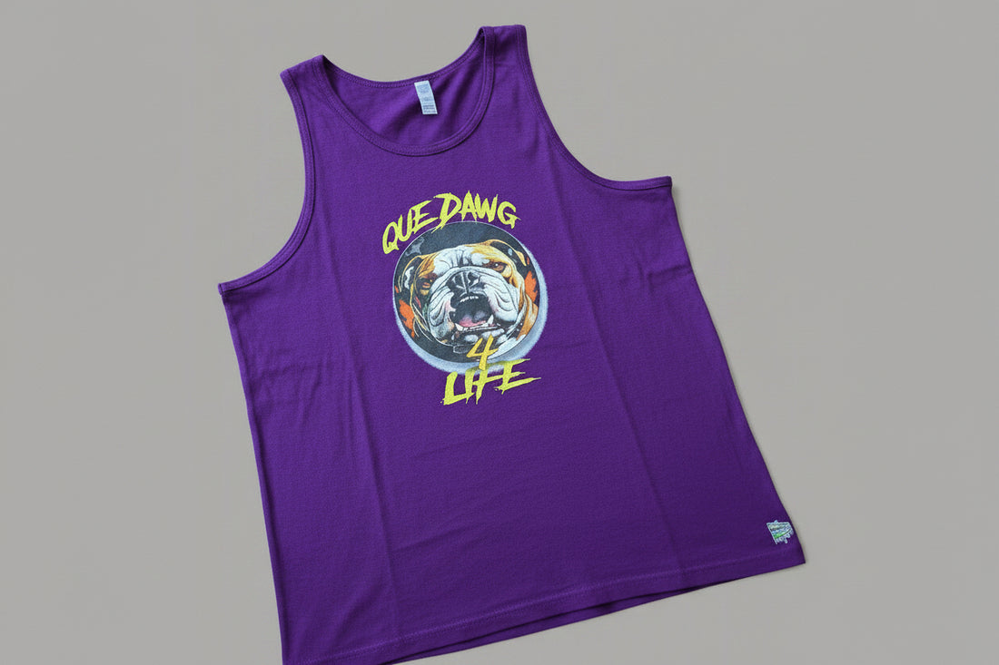 Purple tank top with graphic design on a wooden surface