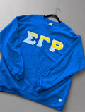 Blue sweatshirt with Greek letters