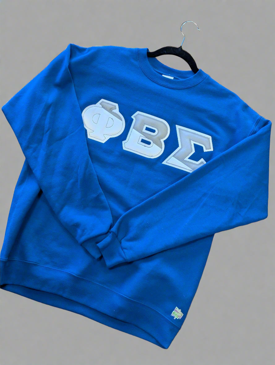 Blue sweatshirt with white lettering on a gray background