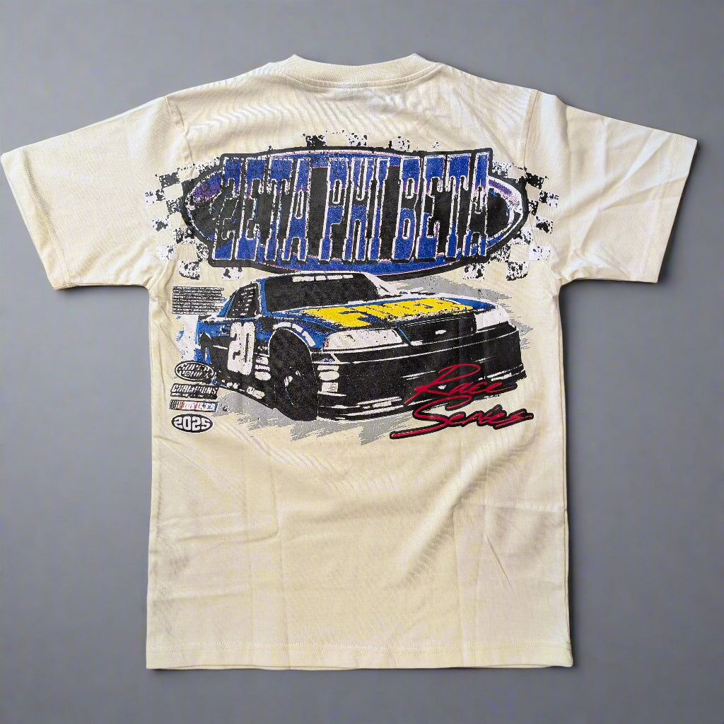 Beige t-shirt with a racing car graphic and text on a gray background