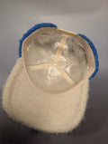 cream colored satin-lined inner hat 