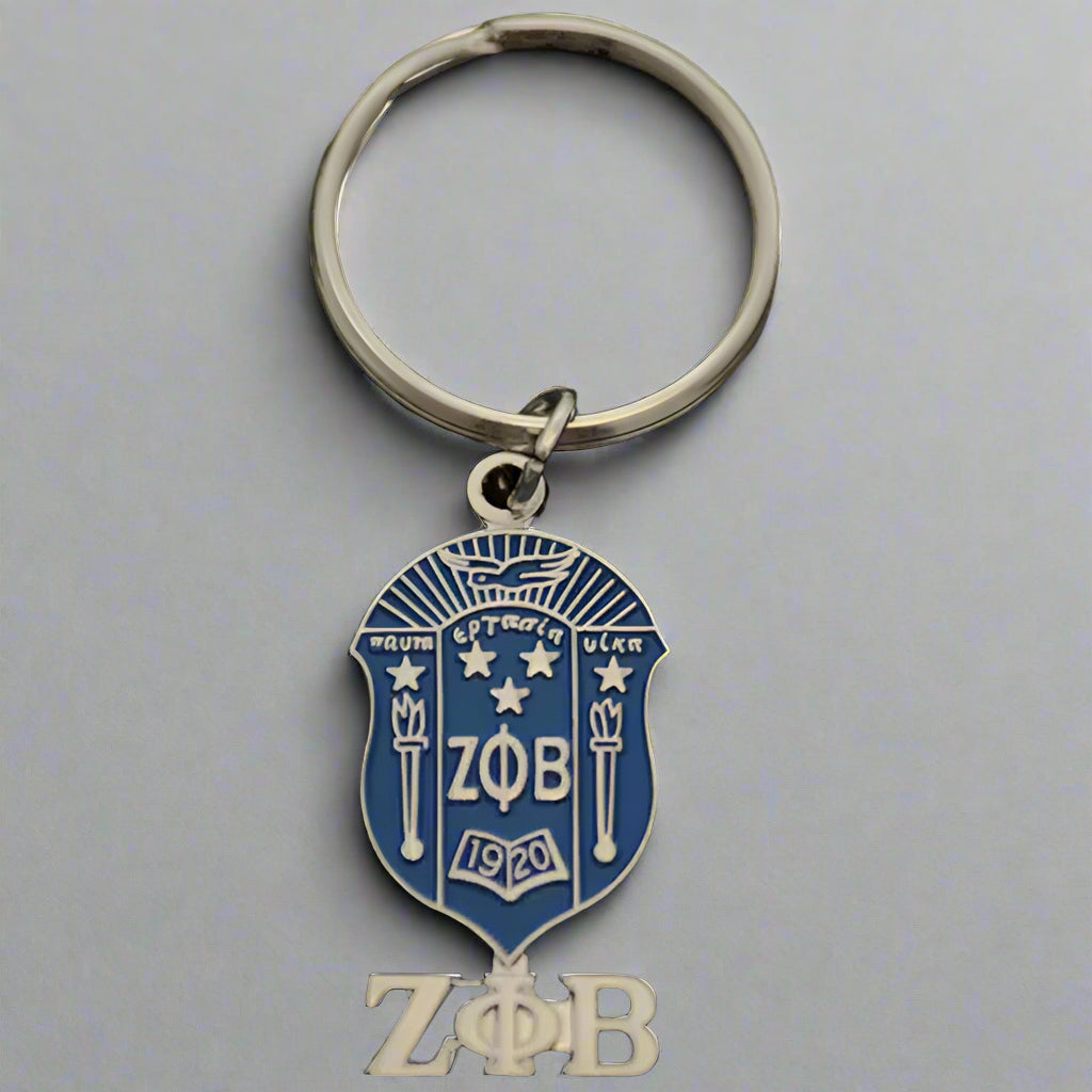 Keychain with Zeta Phi Beta logo on a black background